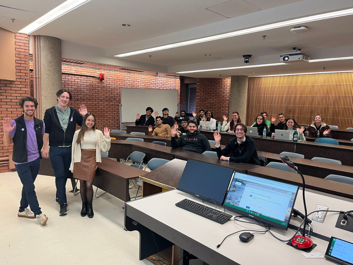 A hi finance guest speaker presenting to a class of students